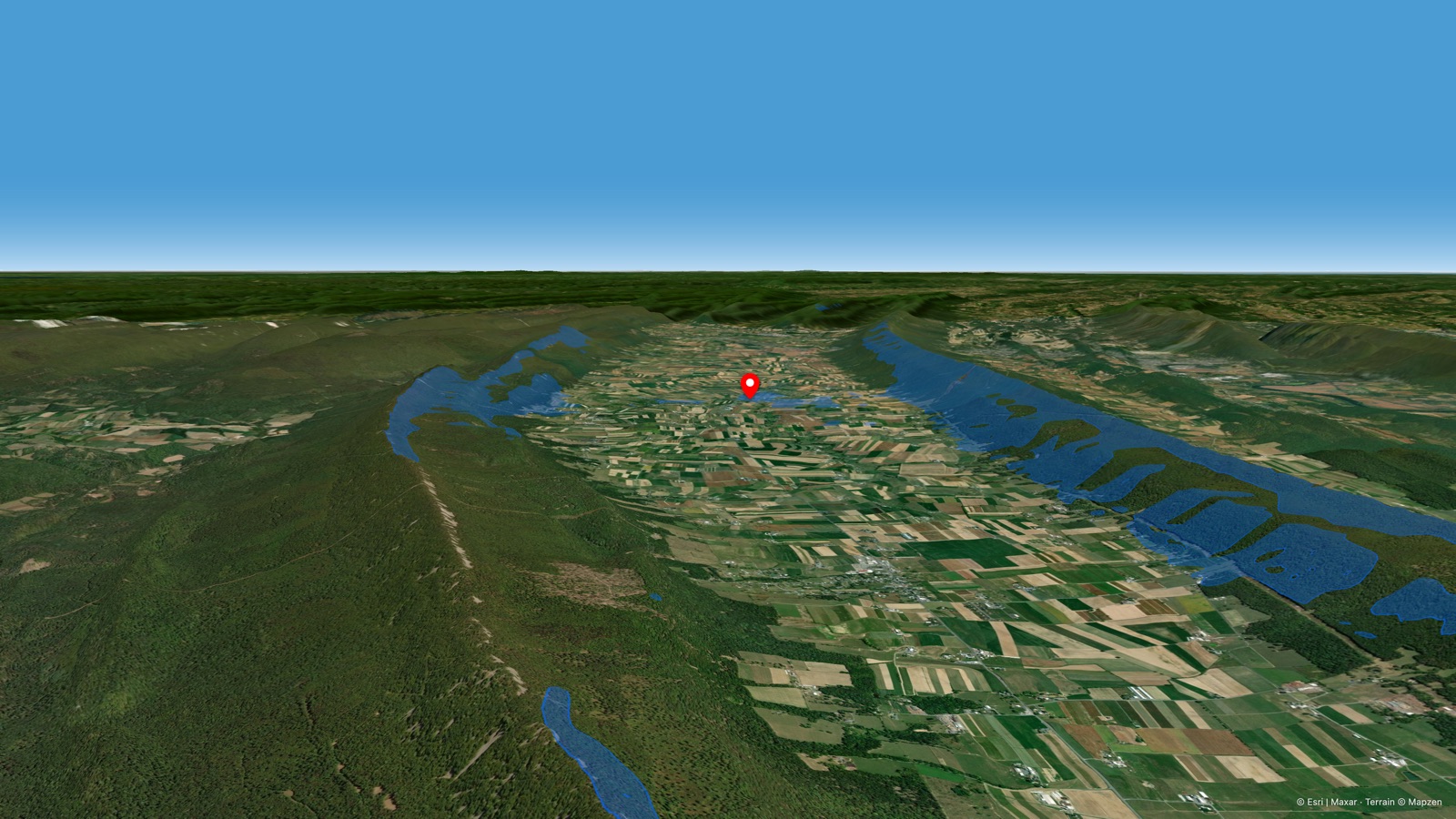A pilot's-eye 3D view over Big Valley's parallel ridges from the launch point, rendered in the app's Studio mode