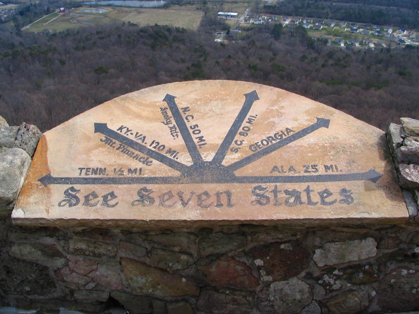 The metal "See Seven States" marker at Lover's Leap: a compass engraved with the direction and mileage to each of the seven claimed states
